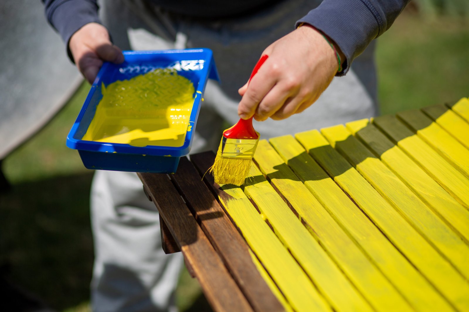 closeup shot of a construction worker painting a t 2026 03 18 07 03 19 utc scaled