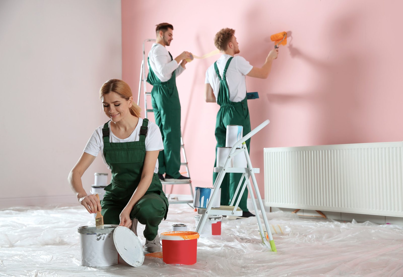 team of professional decorators painting wall indo 2026 03 10 01 11 50 utc scaled